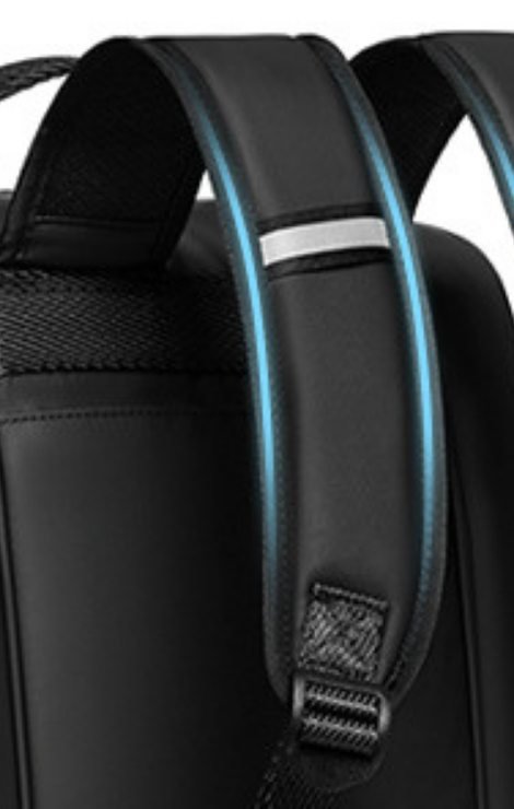 Padded shoulder strap with reflective strip and adjuster buckle